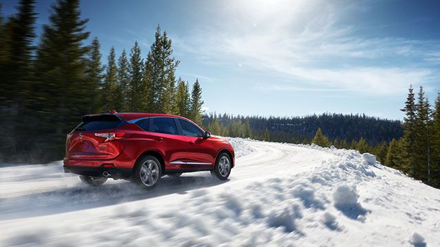 2019 Acura RDX driving in mountain snow